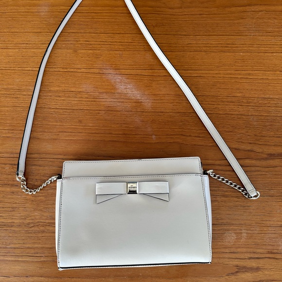 kate spade Handbags - Kate Spade Cream Crossbody Bag with Bow Detail